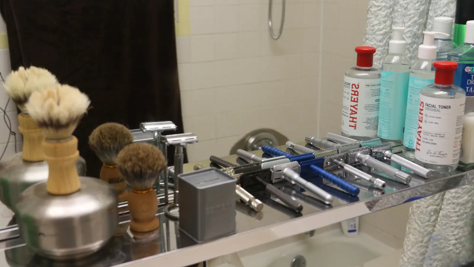 Manscaped Lawn Mower and Philips Norelco OneBlade body trimmers side by side — head-to-head comparison of the two flagship male body groomers