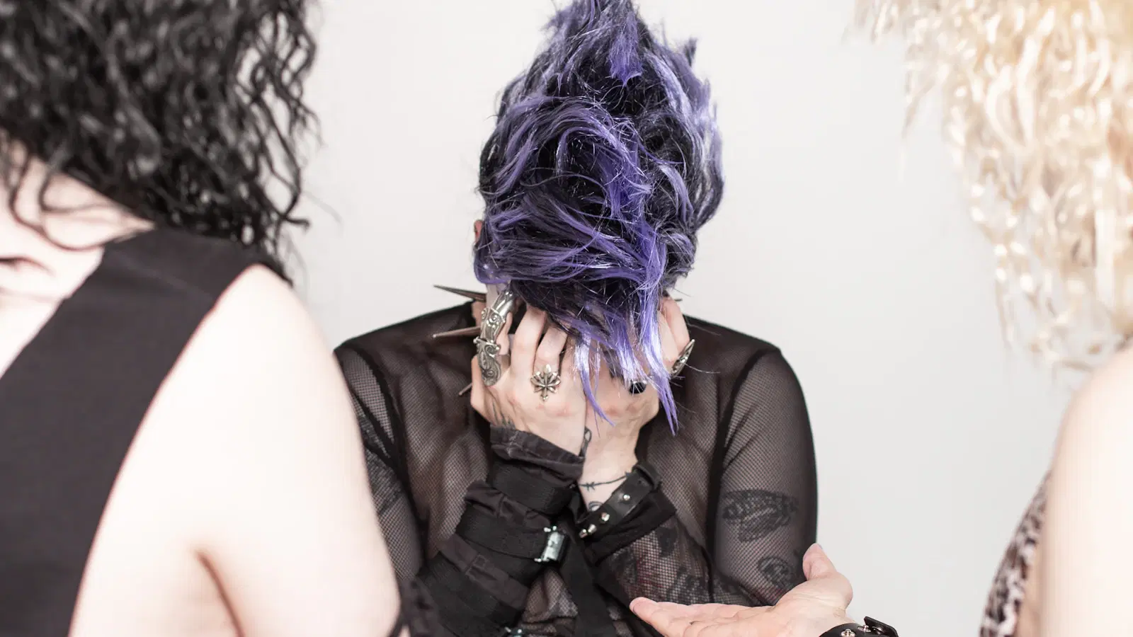 Emo femboy style guide — 2000s-core outfits, band tees, studded belts, and the eye makeup that finishes the look