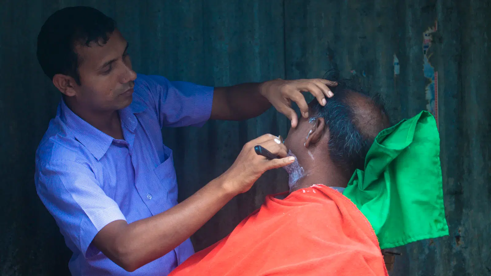 Femboy pit shaving technique — arm raised, short strokes in multiple directions, thick cream layer for slip