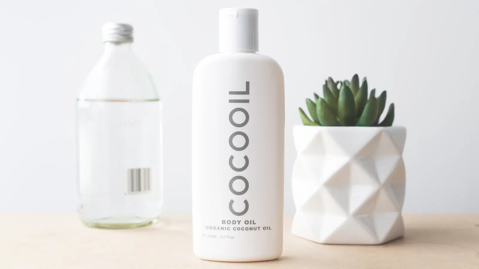 Applying a 2% salicylic acid BHA product with a cotton pad across the lower stomach shaving line to prevent ingrown hairs