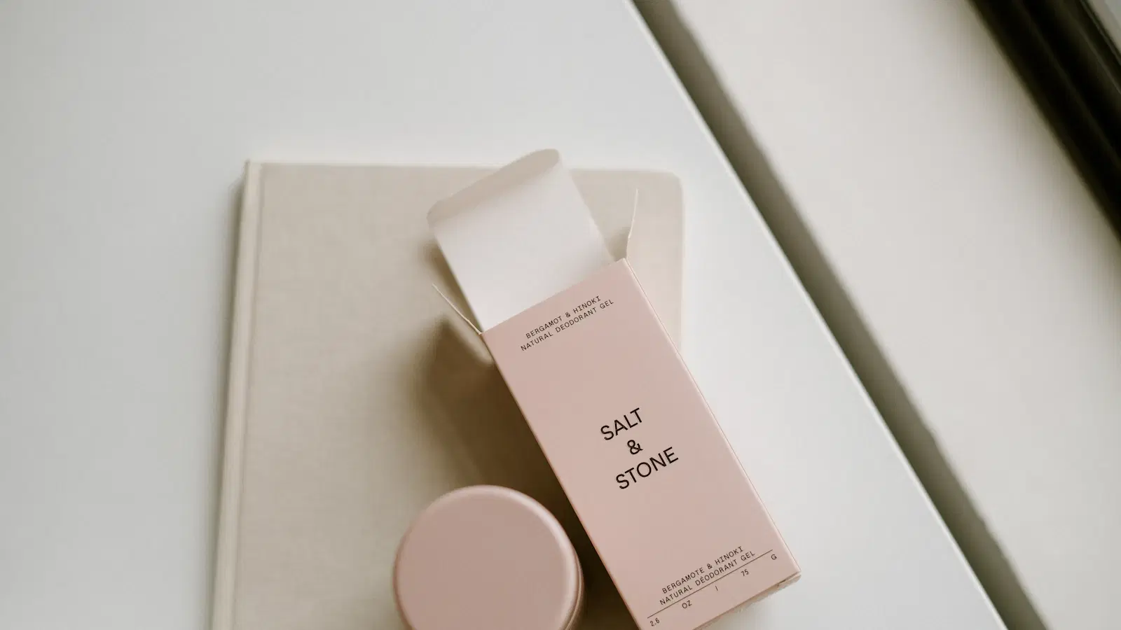 Physical kitchen timer set to 6 minutes next to Nair For Men tube — strict timing is the single most important step in safe depilatory use