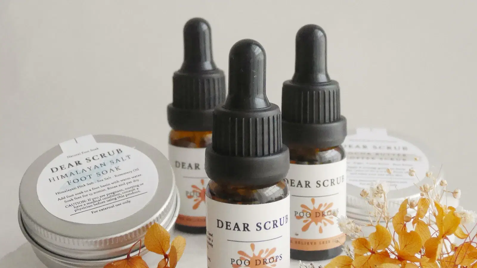 Demo of a dermaplaning face razor held at a 45-degree angle over the upper lip, using short downward strokes to remove peach-fuzz mustache