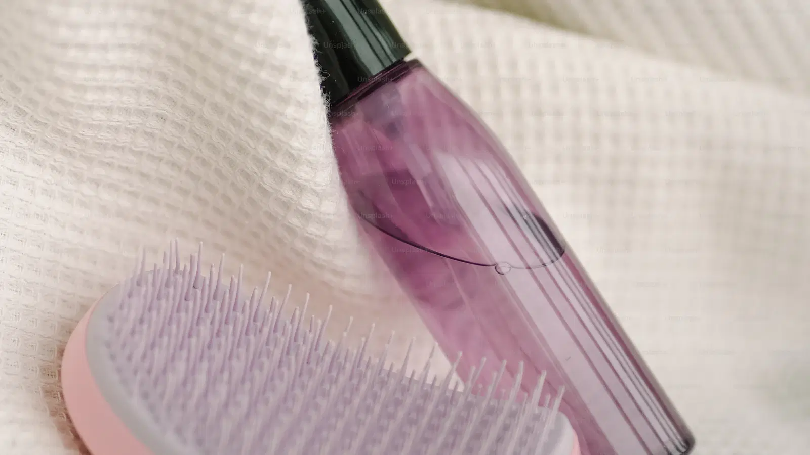 Ceramide moisturizer and vitamin-C serum laid out next to a dermaplane razor — the full post-peach-fuzz-removal aftercare kit