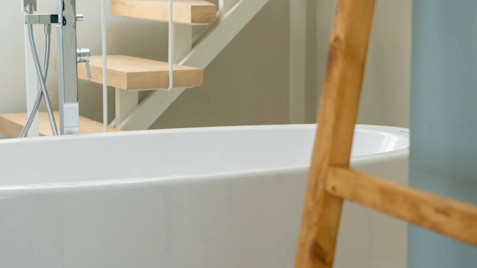 Micro shorts / hot pants on a femboy figure — denim cut with visible back pockets, inseam shorter than the pocket length