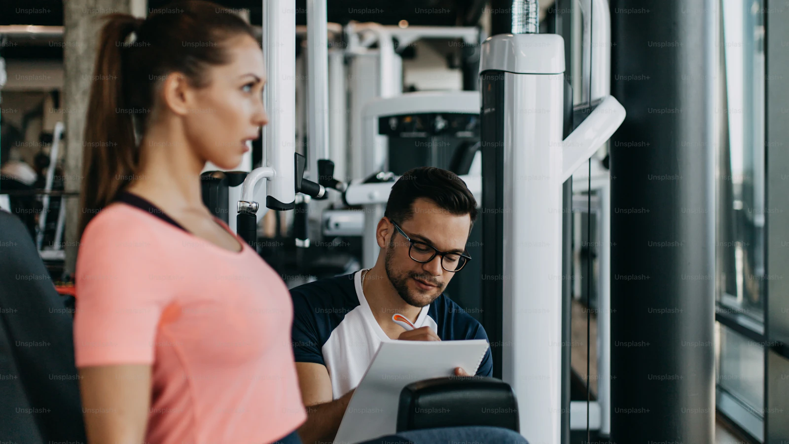 Animated demo of a weighted hip thrust — upper back against a bench, dumbbell on hips, drive up to lockout with a two-second squeeze